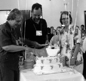 Ruthanne Pitkin, Jon Glase, and Anna Wilson, all chartered members of ABLE, serving the 20th anniversary cake at Wakulla Springs Lodge.